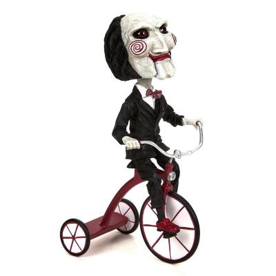 Saw Head Knocker Jigsaw Puppet 20 cm - Neca